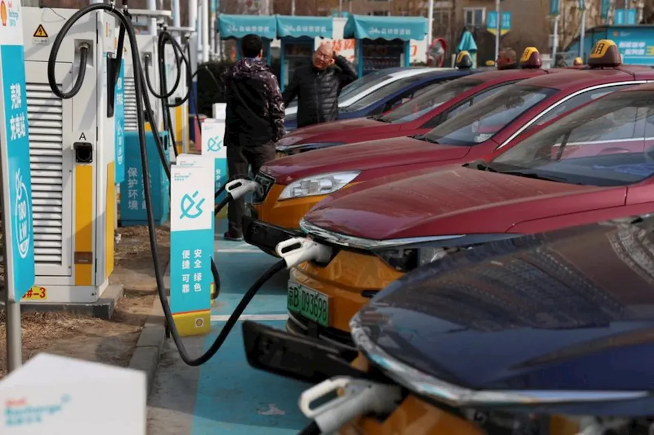 China's Electric Taxis Cushion Oil Shocks, Cutting Imports and Fares