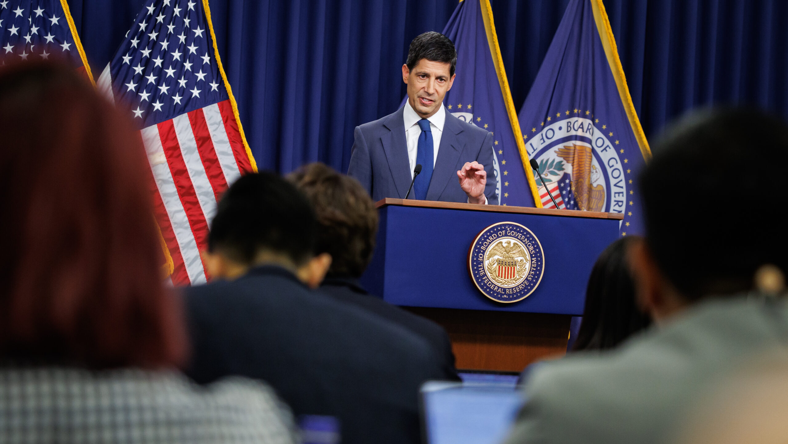 Federal Reserve Holds Rates Steady Amid Split Vote, Warsh Signals Future Hike Possibility