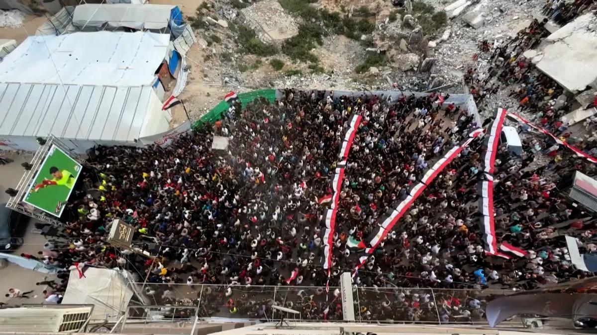 Palestinians in Gaza Watch World Cup Match on Giant Screen Amidst Rubble