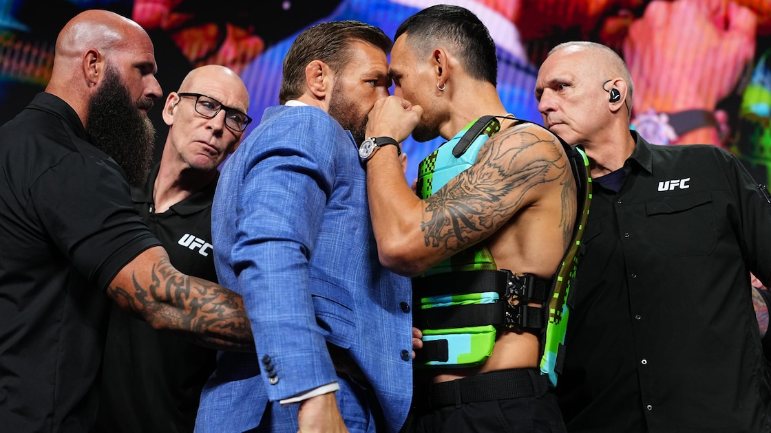 Conor McGregor and Max Holloway Engage in Heated Face-Off Ahead of UFC Rematch