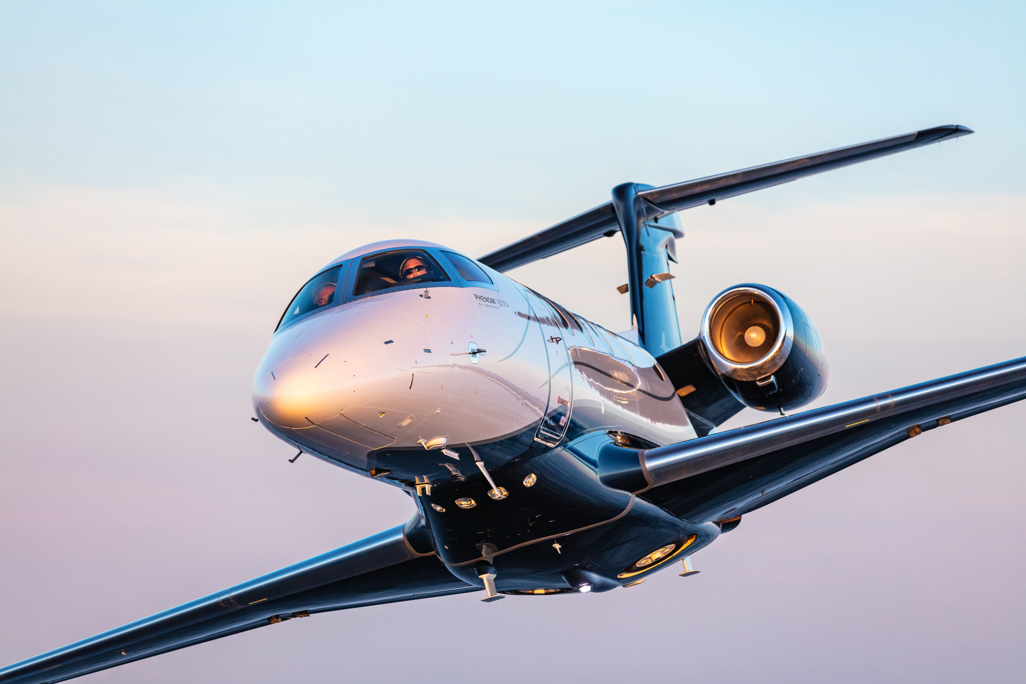 Embraer unveils Phenom 300EV, boosting light jet safety with Autoland and enhanced performance.