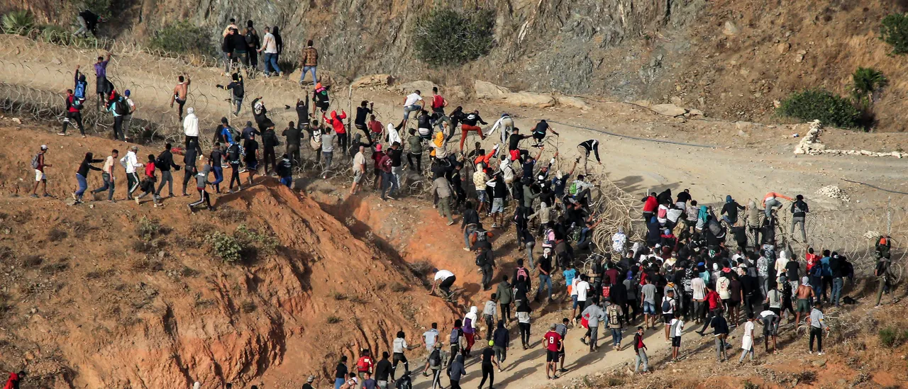 Spain Deploys Troops as Thousands of Migrants Breach Ceuta Border from Morocco.
