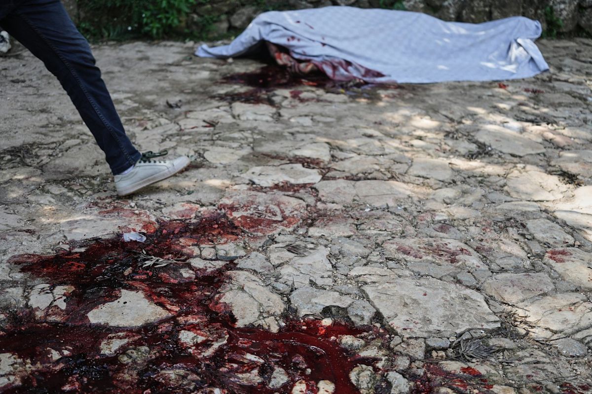 Hundreds gather in Haiti to mourn victims of a brutal gang attack