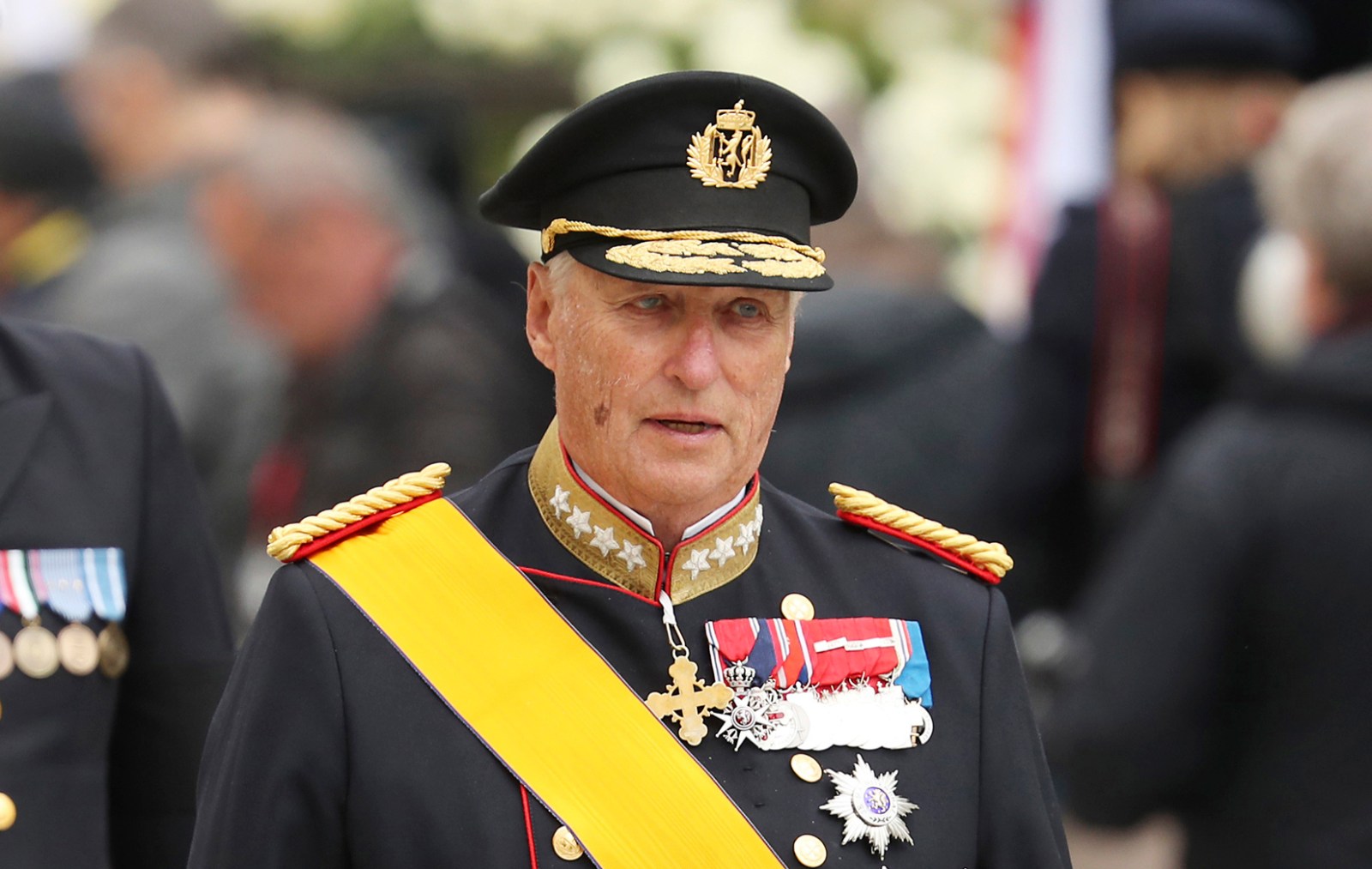 Norway's Queen Mette-Marit joins procession to bring late king's coffin to chapel