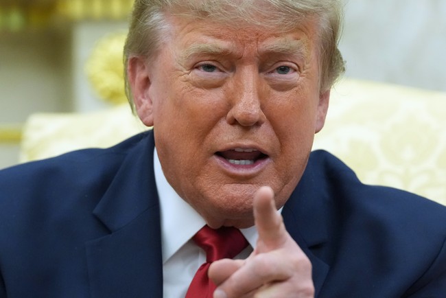 Trump clashes with CNN reporter Kristen Holmes, calls network 'fake news' in Oval Office.