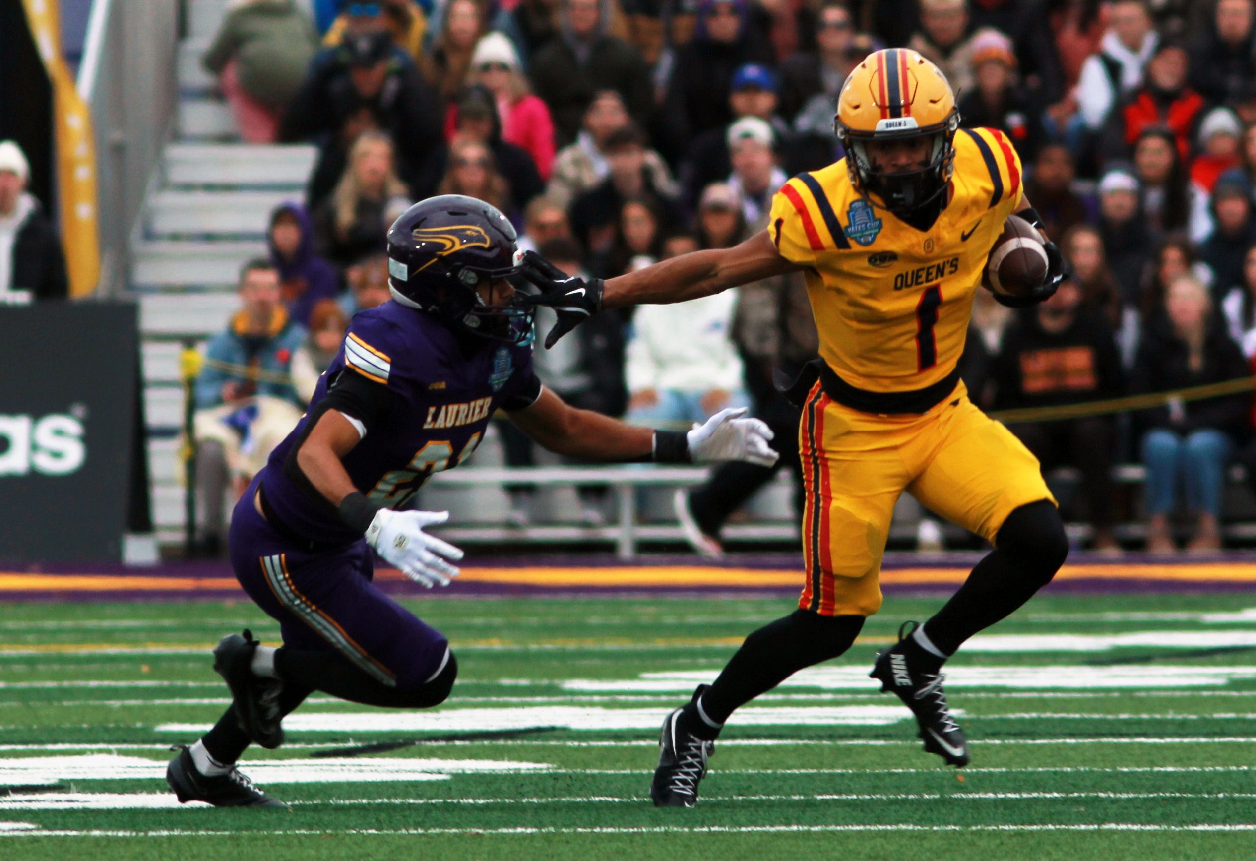 Queen's Gaels confront national champion Laval in key preseason clash ahead of OUA defense.