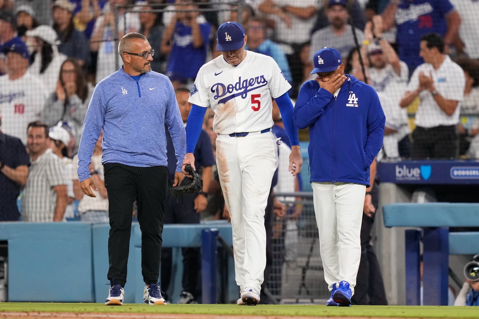 Dodgers' Freddie Freeman falls into Royals dugout, avoids serious injury as Dodgers sweep