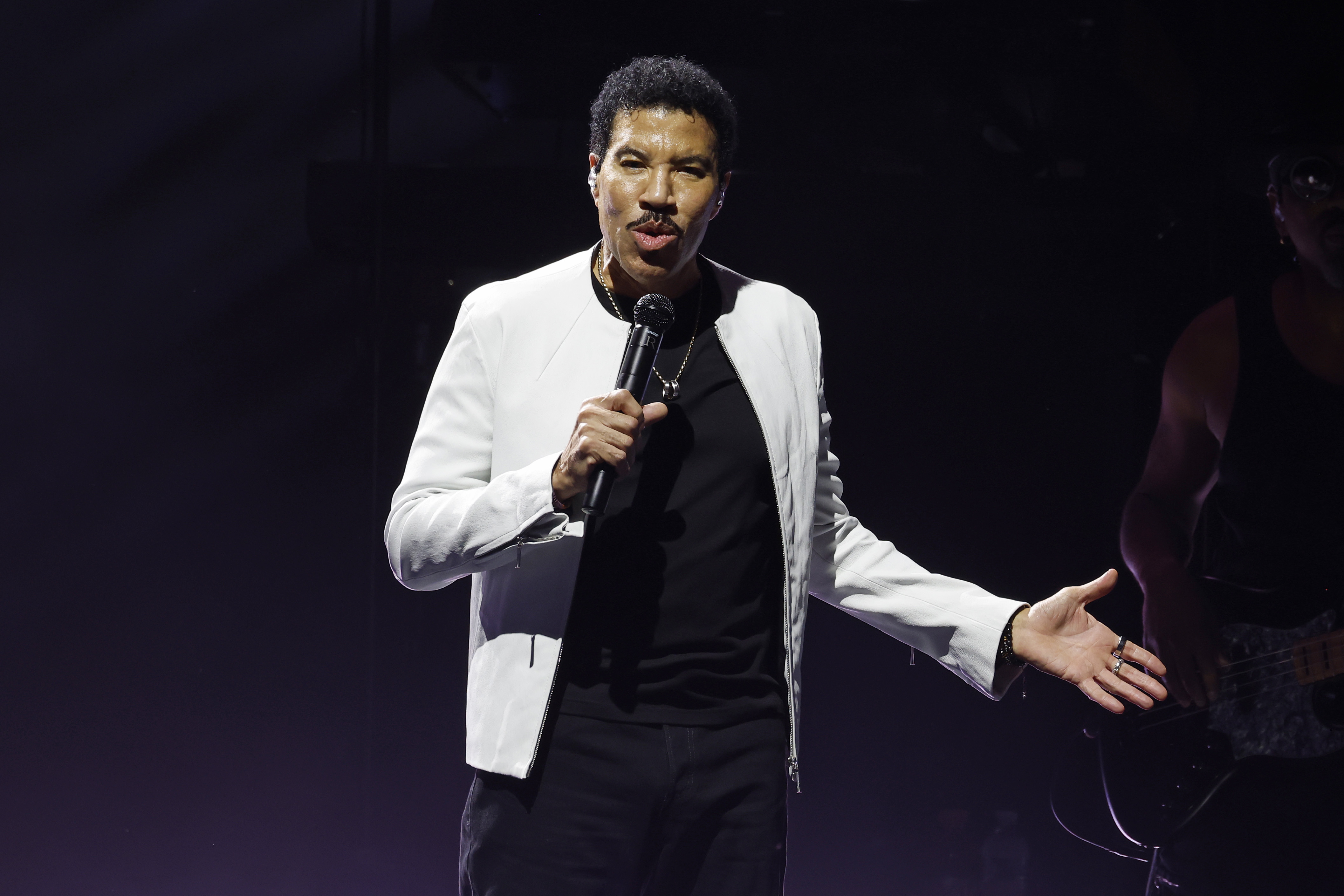 Lionel Richie's Tour Remarks About Chris Brown's Past Spark Debate, Leads to Apology