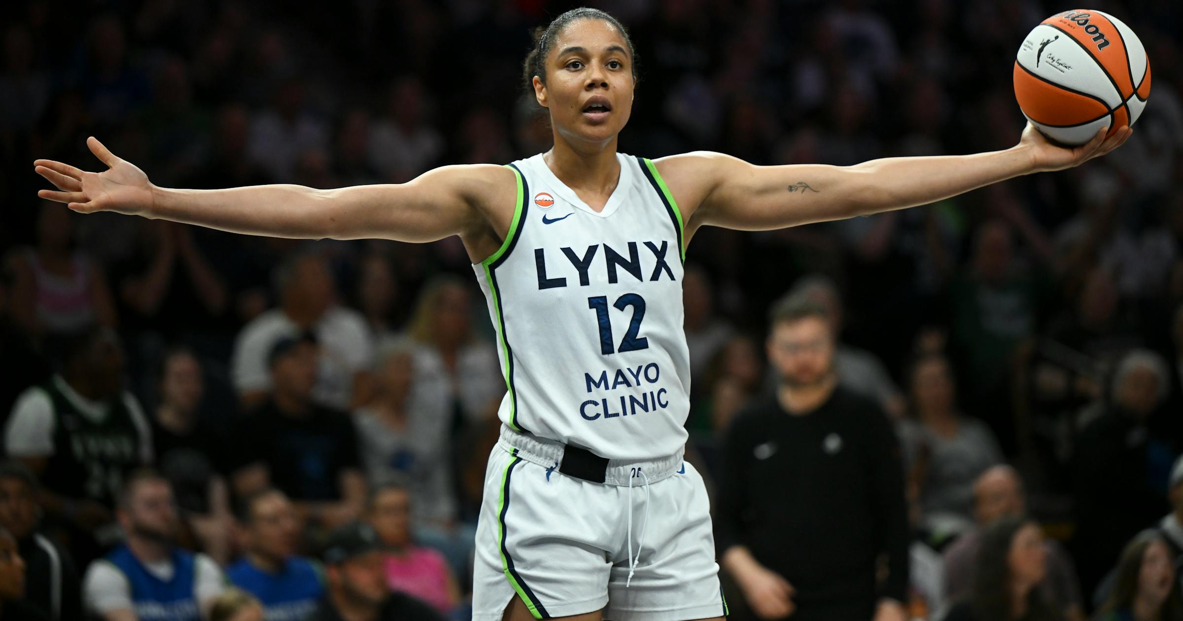 Minnesota Lynx Defeat Las Vegas Aces 92-87, Led by Miles and Coffey