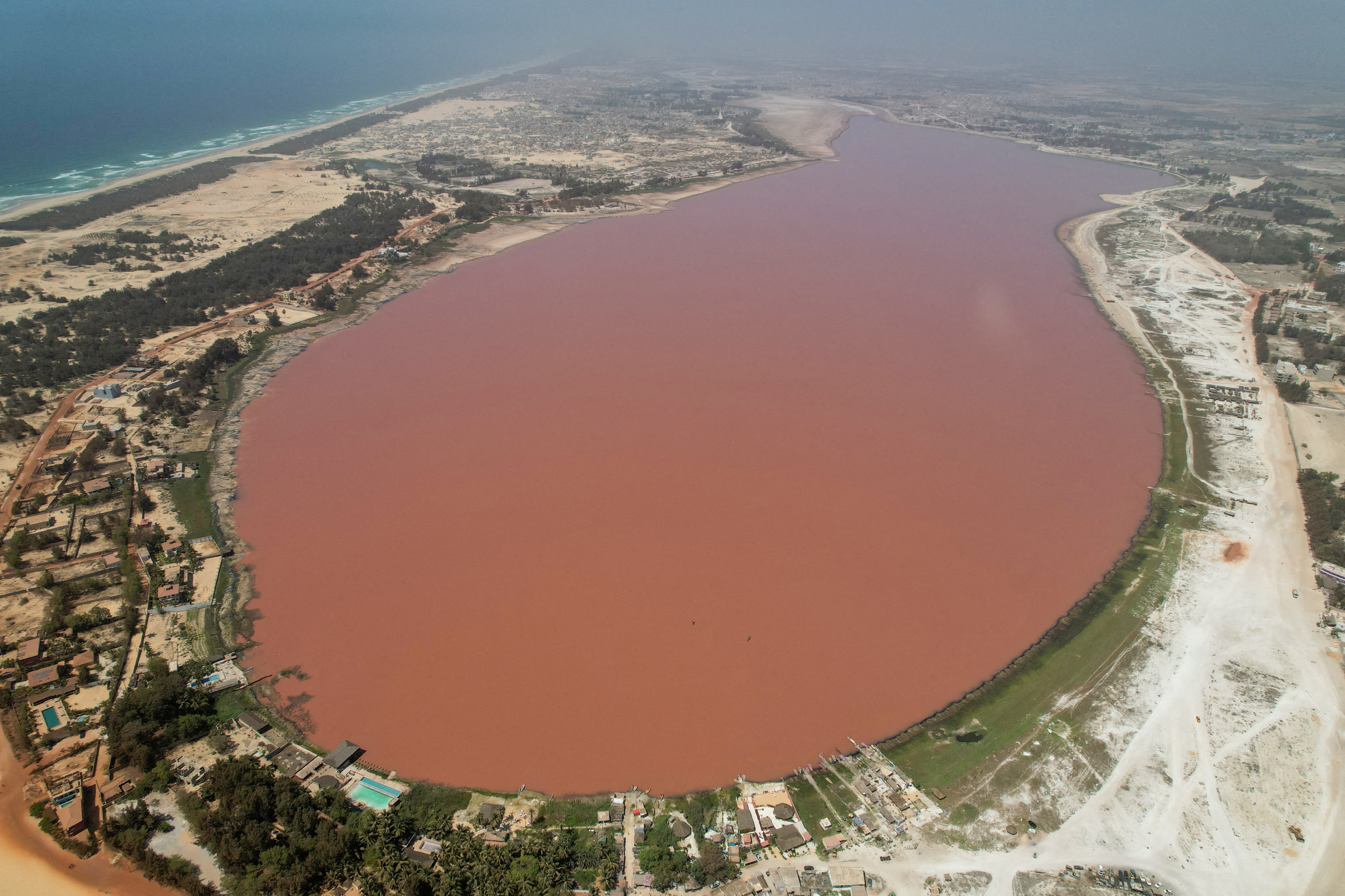 Senegal's iconic 'Pink Lake' regains vibrant rosy hue, boosting crucial local salt trade.