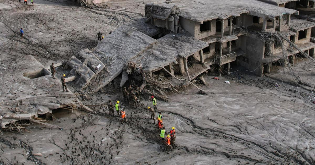 Search operations continue across Nepal as catastrophic flash floods leave over 690 dead