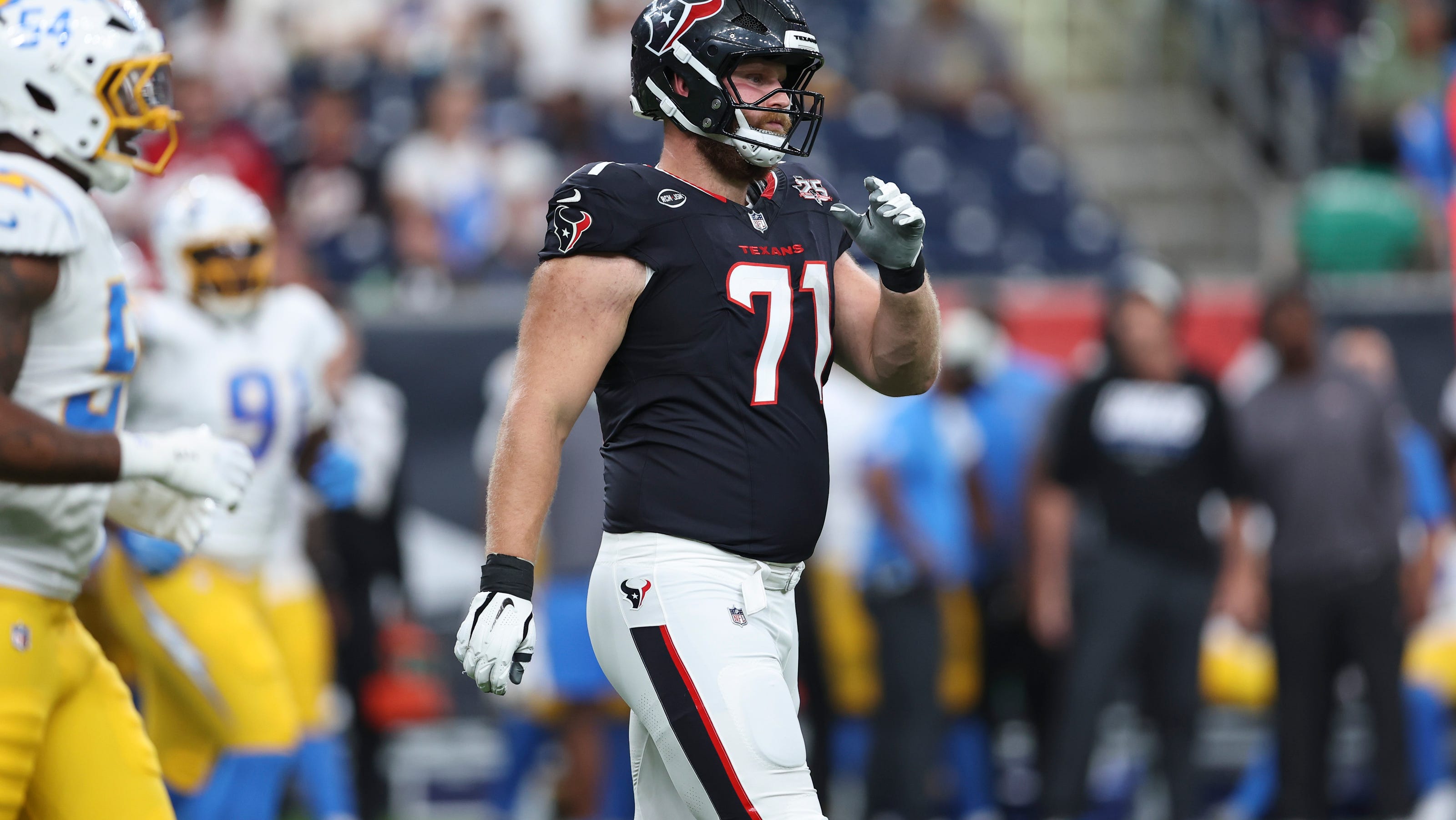 Texans starting right tackle Braden Smith carted off with apparent foot injury.
