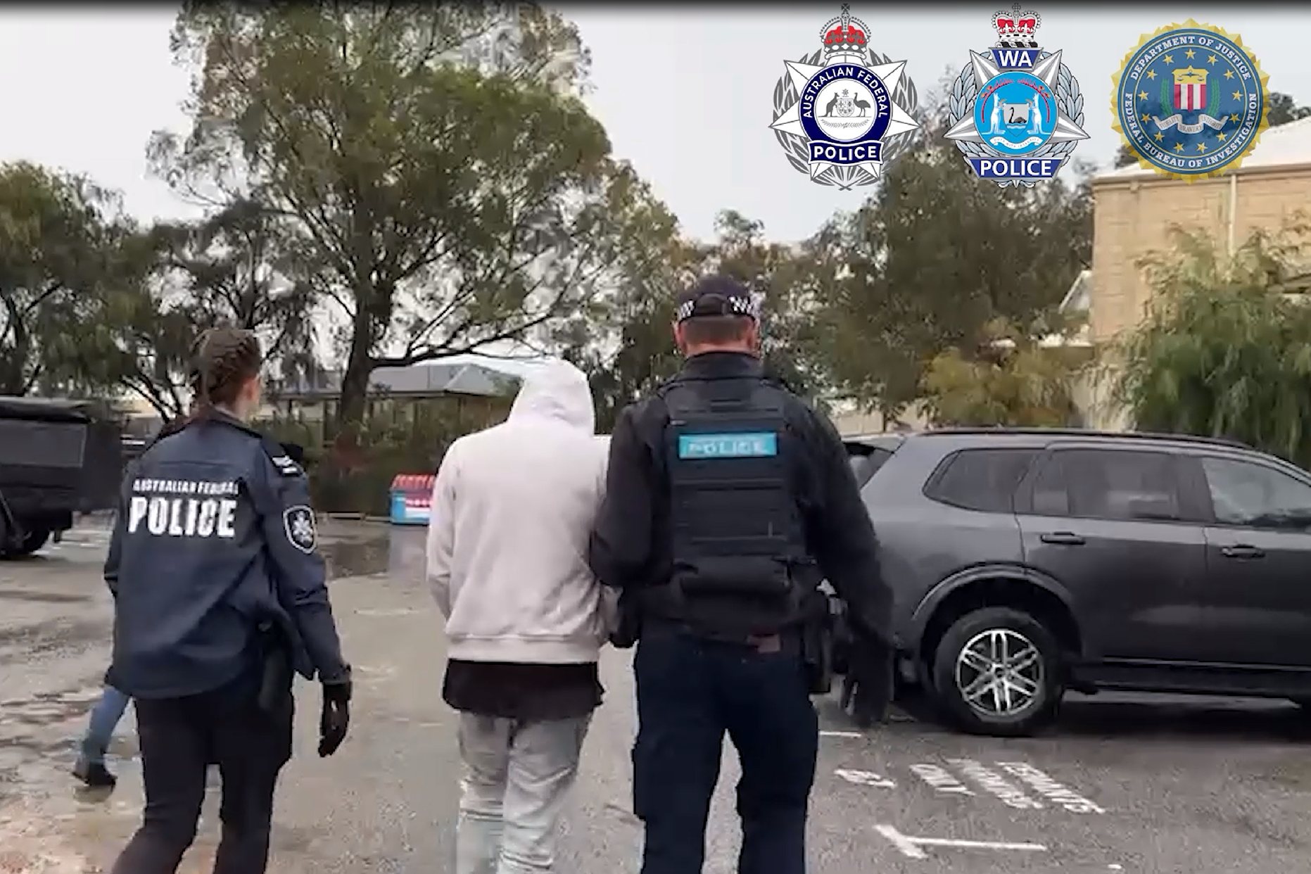 Two Western Australian men charged in international cybercrime supply-chain attack