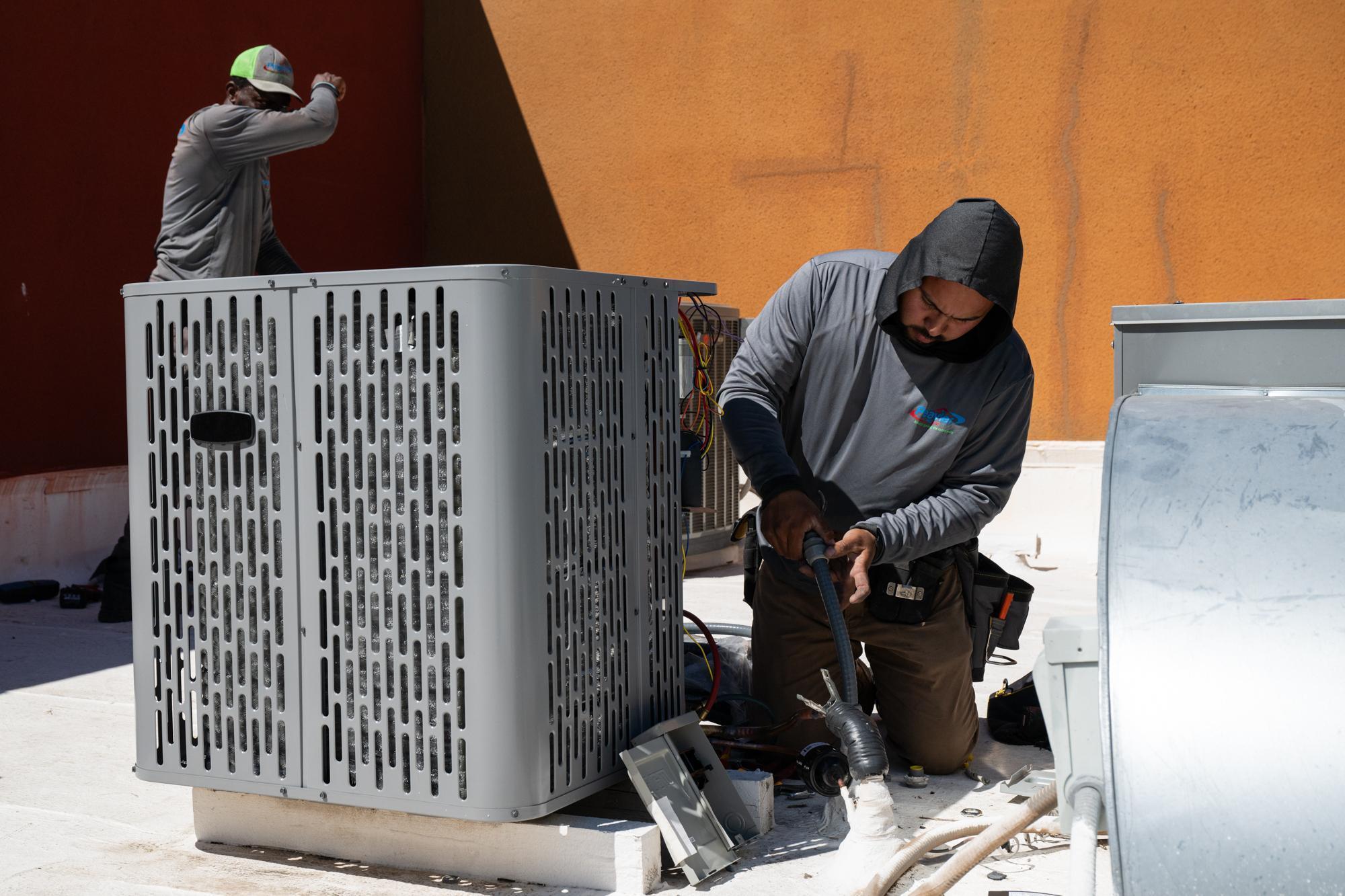 Air conditioning saves thousands of lives annually while worsening global warming, experts warn
