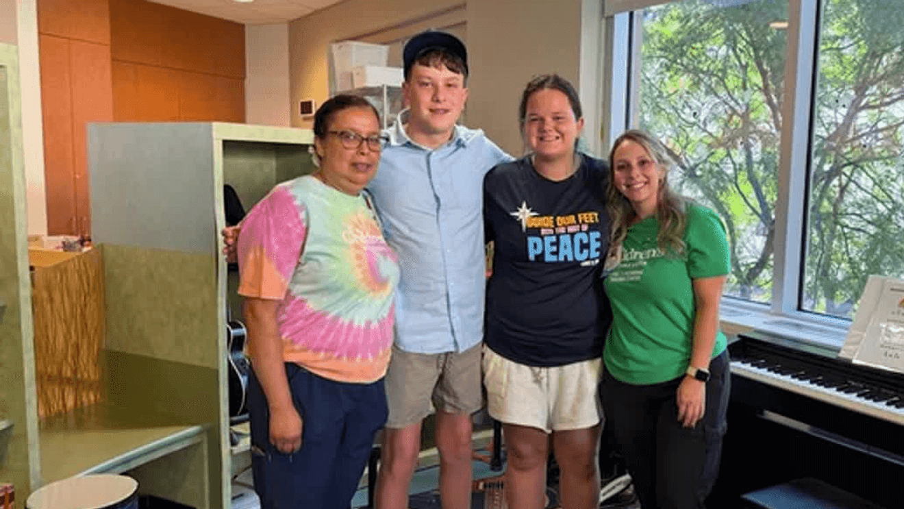 Boy injured shielding classmate during deadly shooting reunites with hospital staff