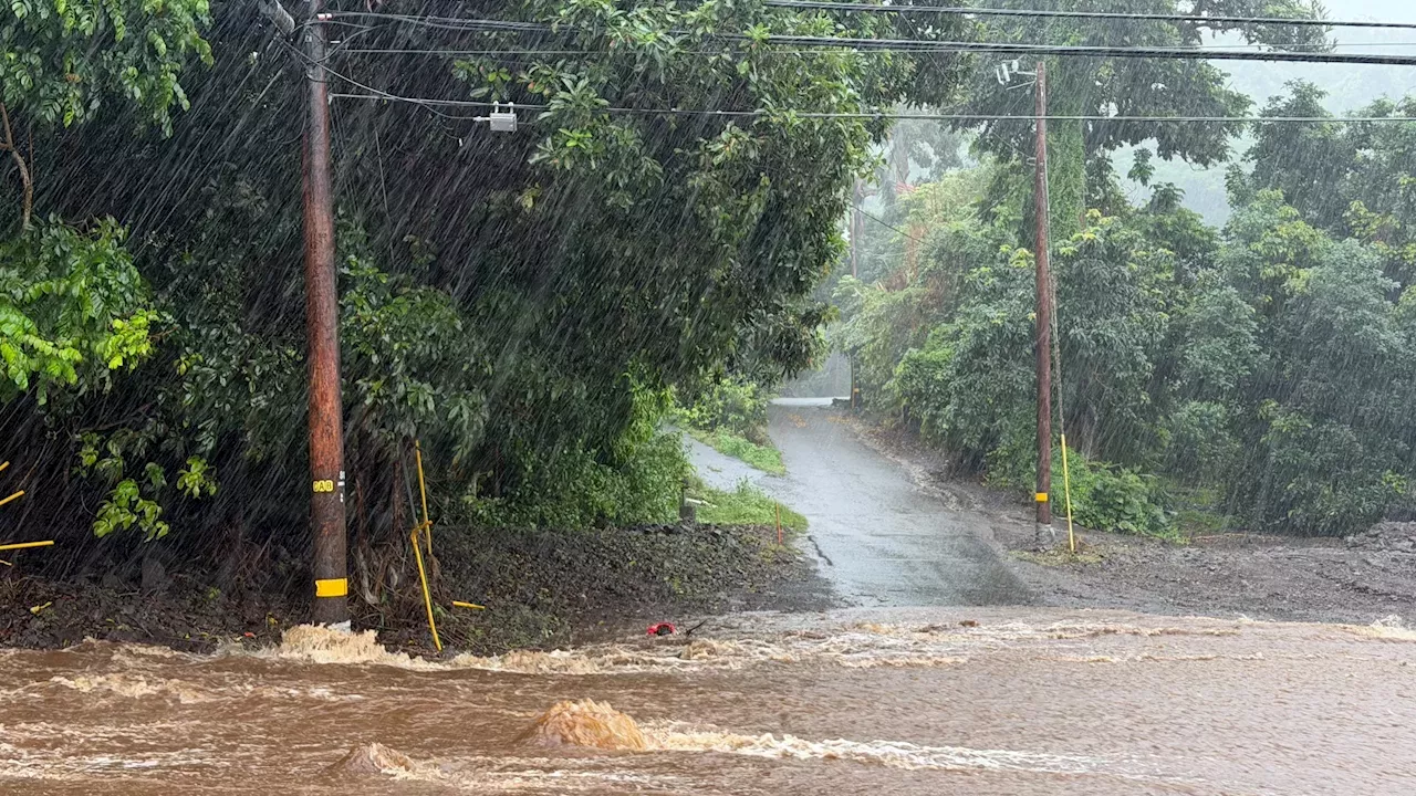 Heavy rains from departing Hurricane Nolo close major roads across the Big Island