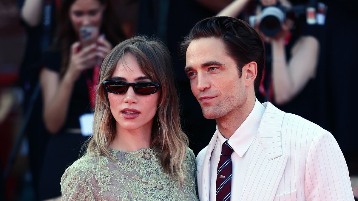 Suki Waterhouse and Robert Pattinson arrive together for the Venice Film Festival premiere.