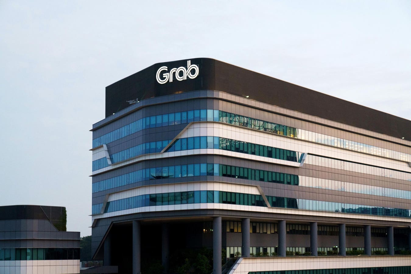 Grab Agrees to Buy Majority Stake in Atome Financial for $1.49 Billion