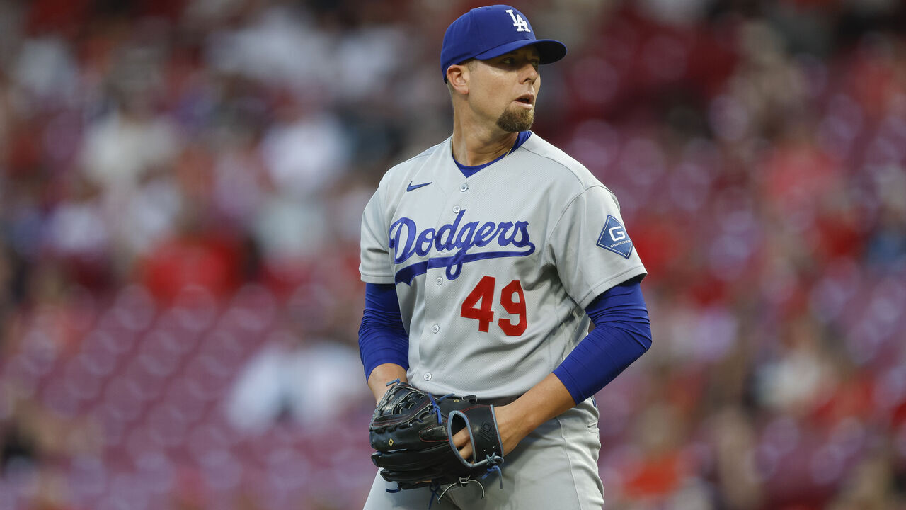 Dodgers reliever Blake Treinen misses postseason after suffering right shoulder injury during warmups.