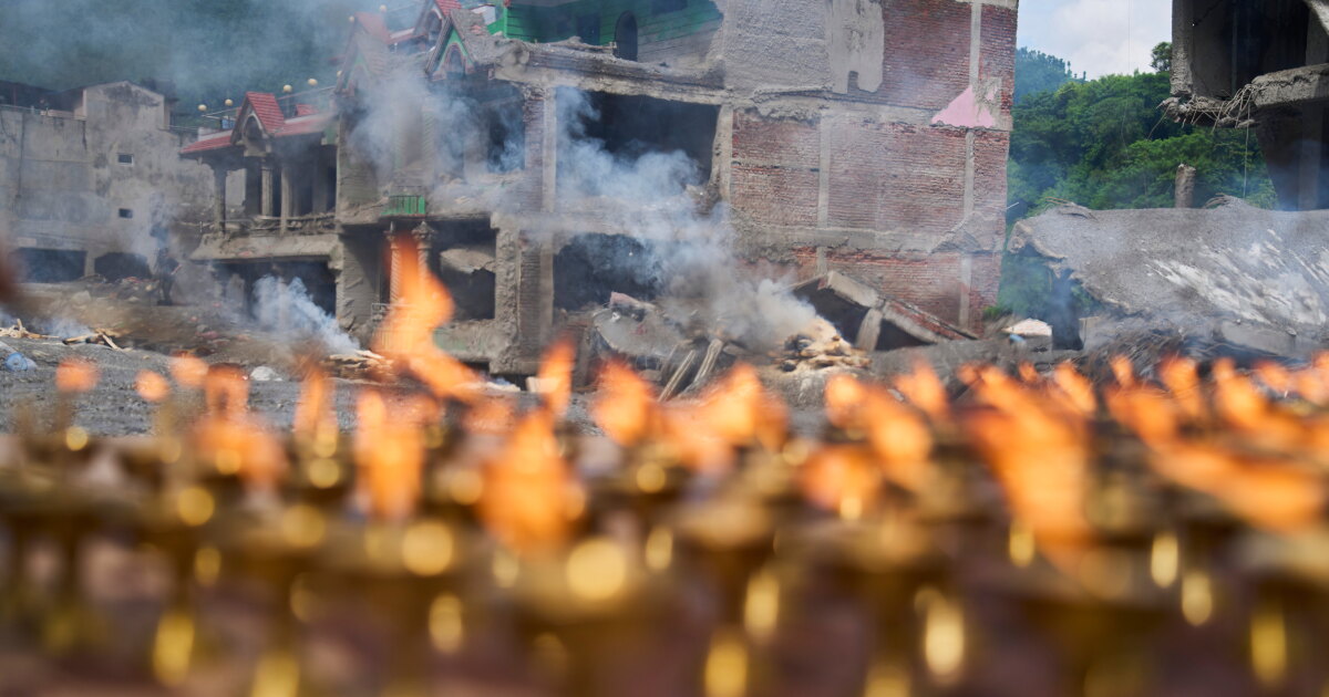 Nepal holds a day of mourning after devastating floods kill over 1,300 people.