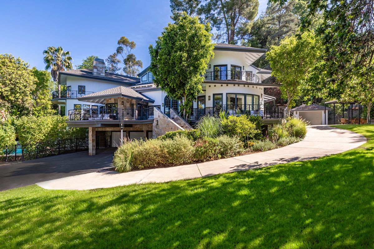 Selena Gomez sells her custom Encino estate for $5.4 million after months on market.