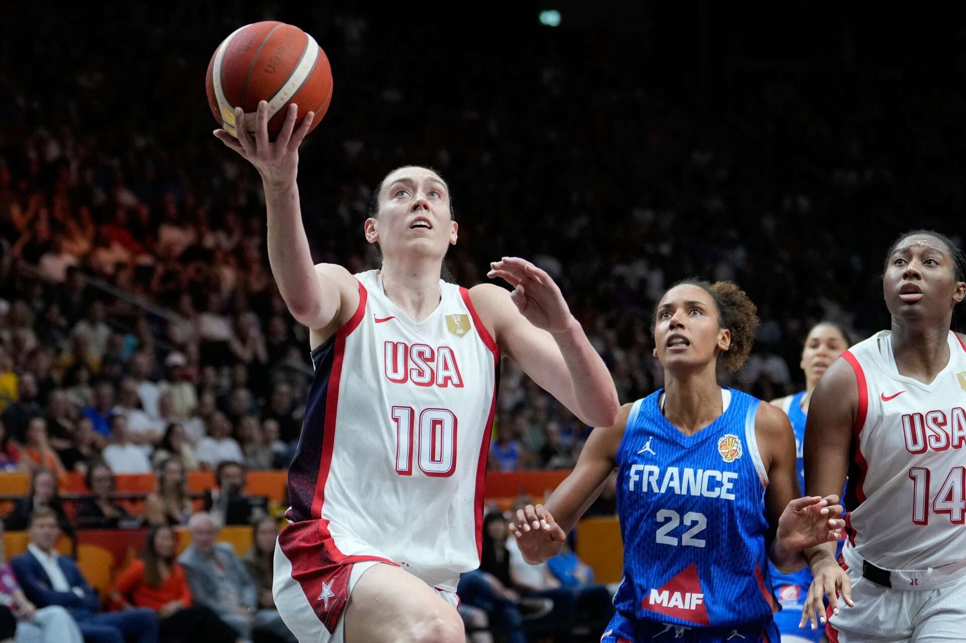US women secure fifth consecutive FIBA World Cup title by defeating France 97-79.