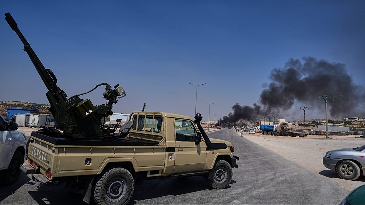 Deadly explosion at a temporary weapons depot in Syria's Idlib province kills 14.