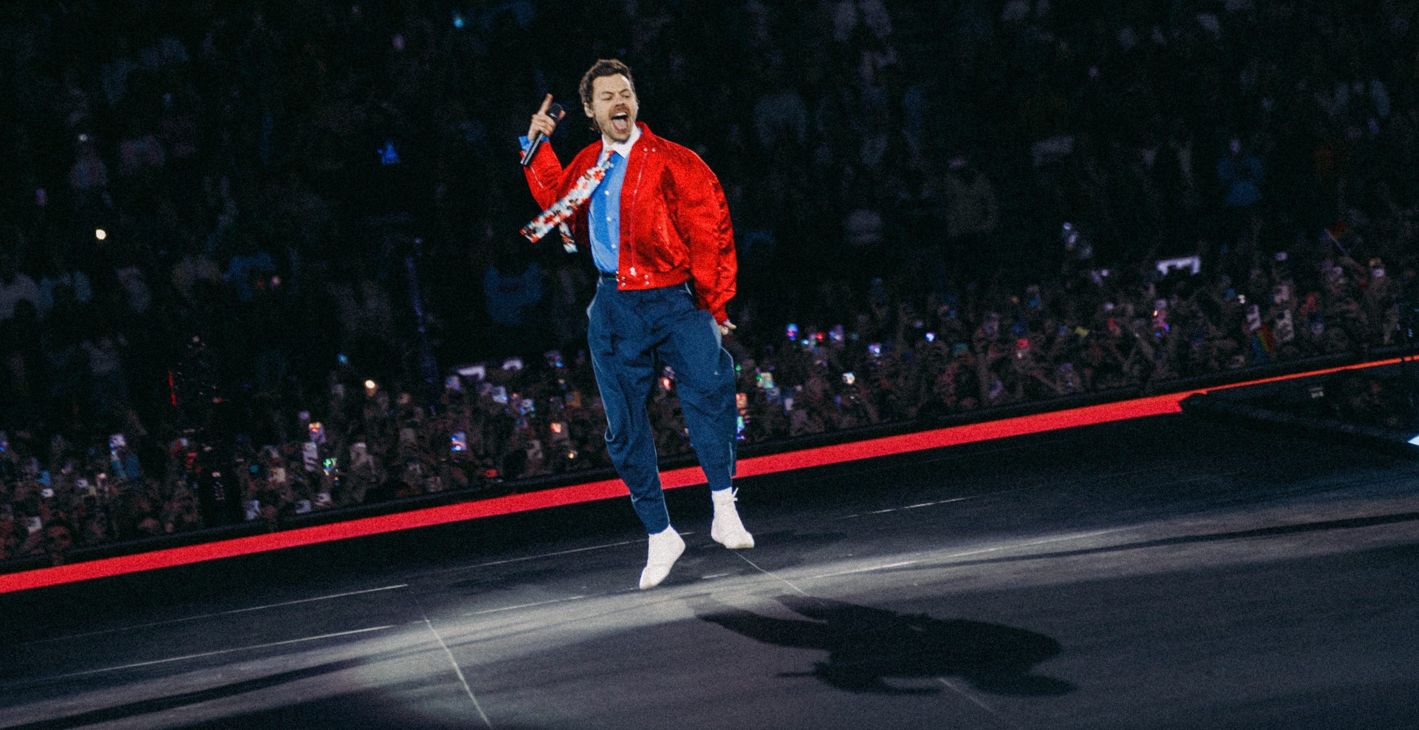 Harry Styles faces intense fan backlash over NYC concert ticket artwork timing.