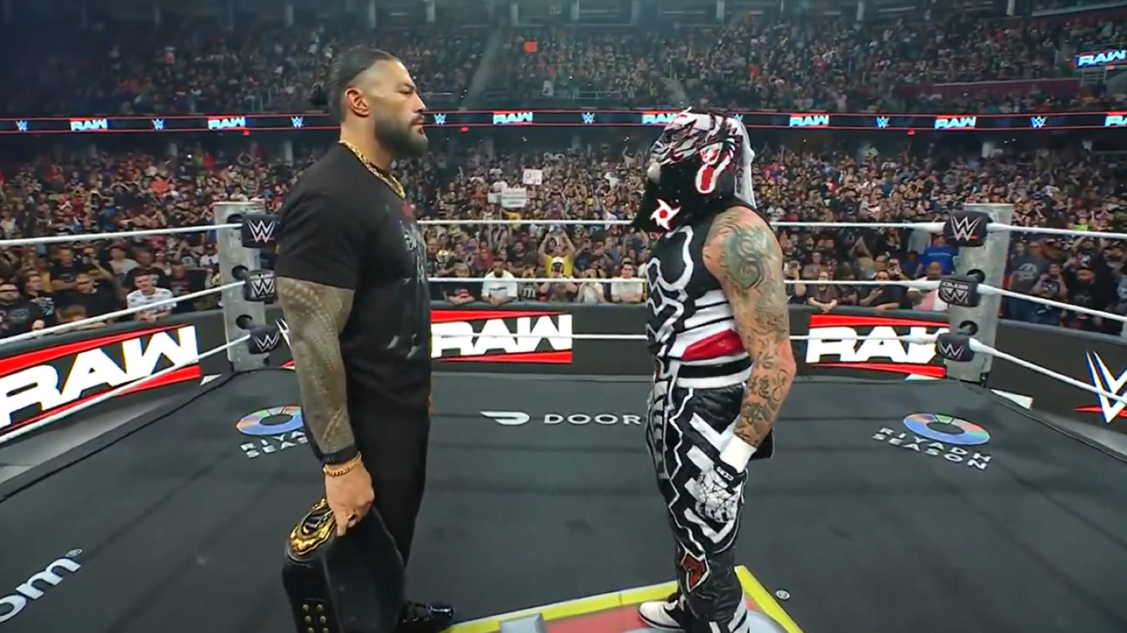 Roman Reigns looms over Penta following a chaotic WWE Raw Netflix taping in Cleveland.
