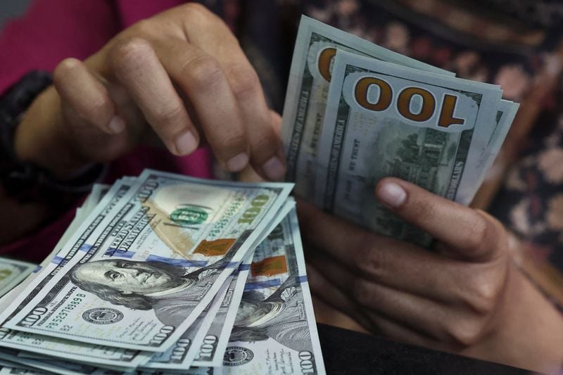 Sterling hovers near three-month lows against the dollar amid rising energy prices and surging U.S. yields.