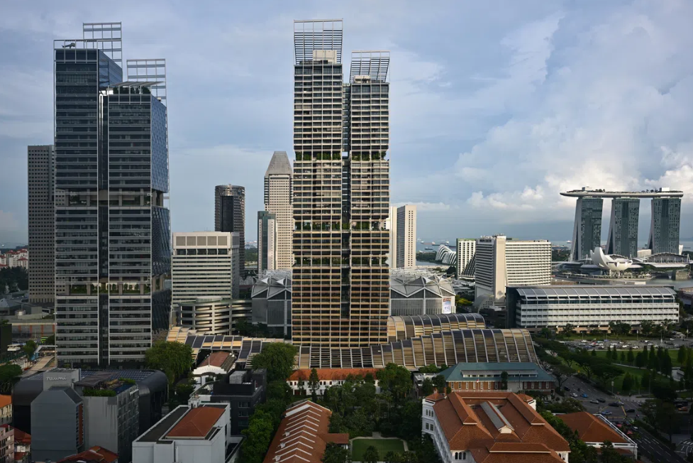 Singapore expands auction of luxury properties linked to major money-laundering case.