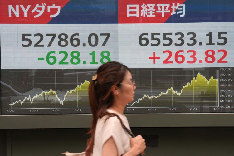 Stocks fall and oil tops $100 as U.S.-Iran conflict disrupts global markets