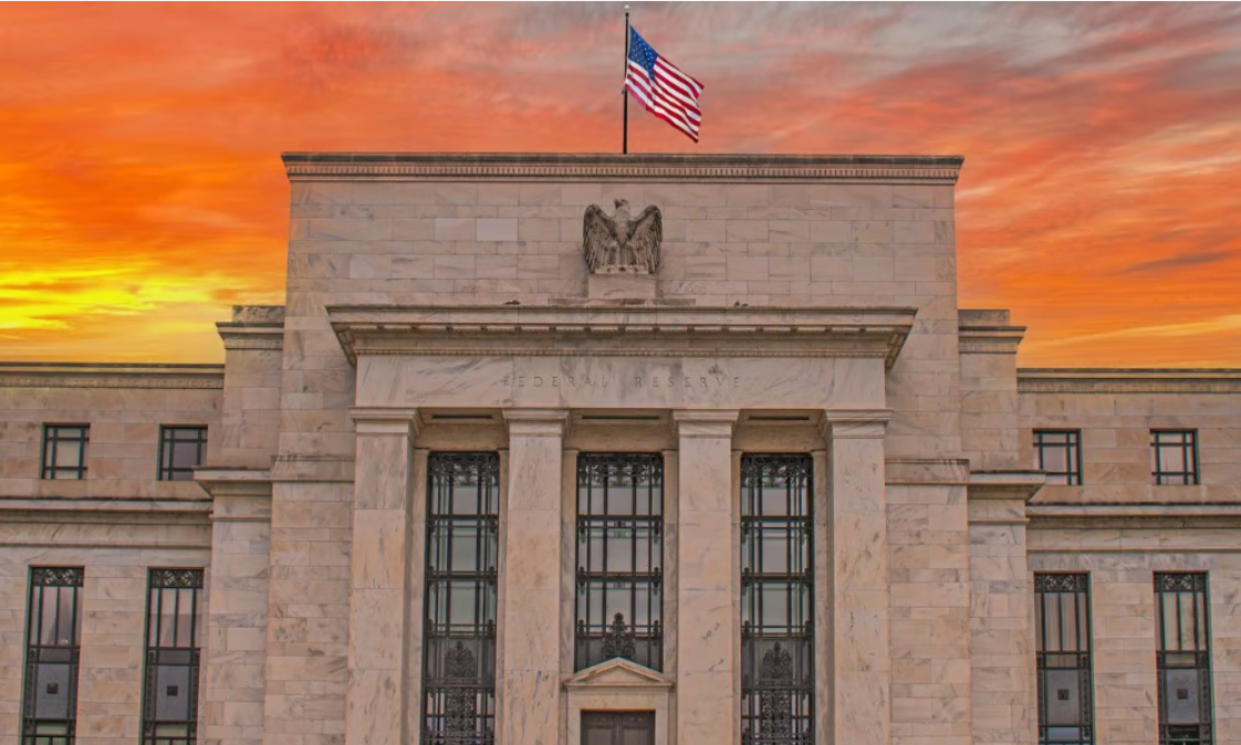 Federal Reserve warns further interest rate hikes remain possible if inflation persists.