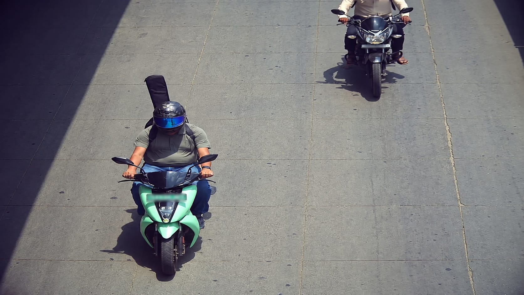 Bengaluru AI Traffic Camera Fines Scooter Owner Over Mistaken Guitar Case