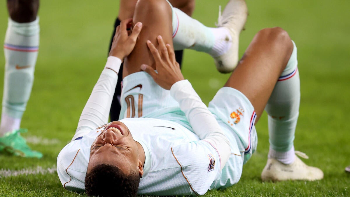 Kylian Mbappé Limps Off With Apparent Knee Injury After Scoring Record Goal