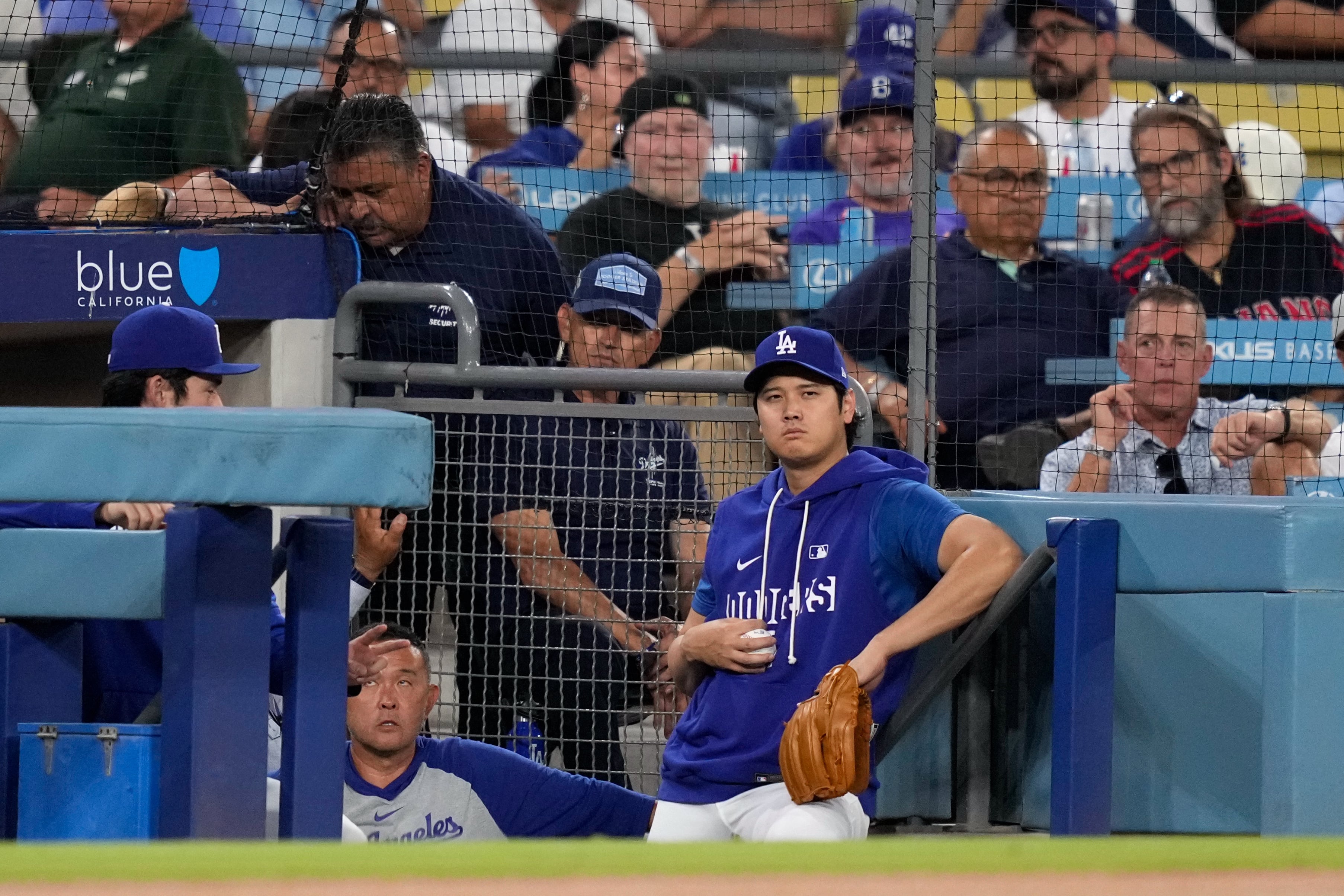 Dodgers weigh injured list stint as Shohei Ohtani battles right arm discomfort.
