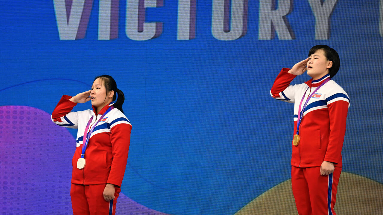 North Korea's Ri Song-gum wins gold and sets three world records at Asian Games.