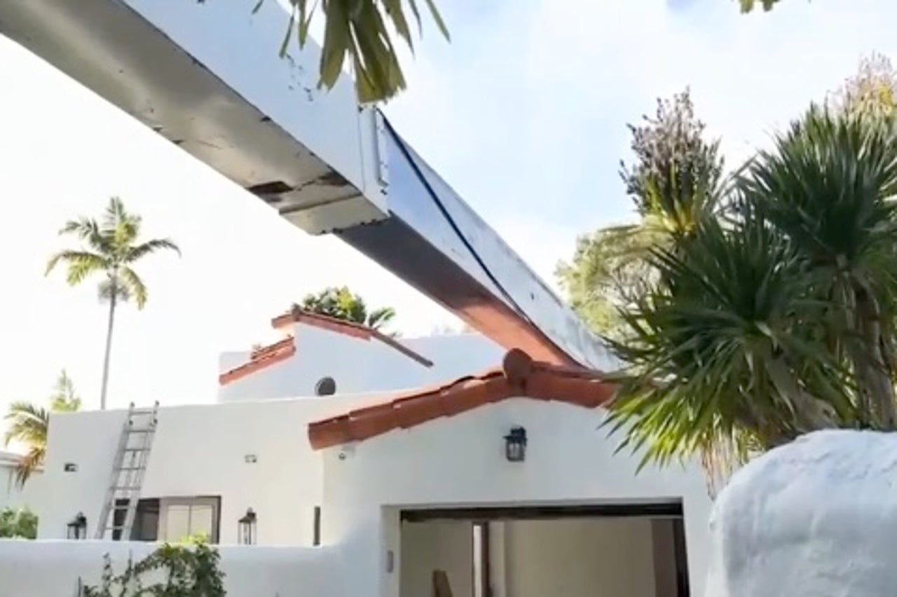 Two cranes toppled onto a Fort Lauderdale home after a second collapse during recovery.