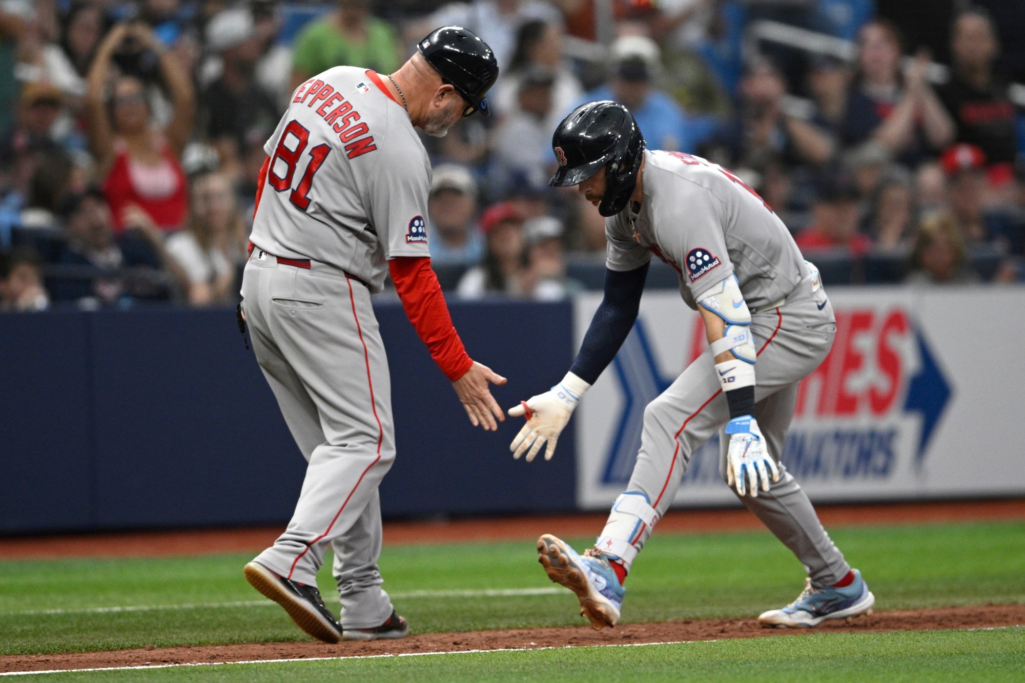 Red Sox clinch wild-card berth after completing a historic regular-season turnaround.