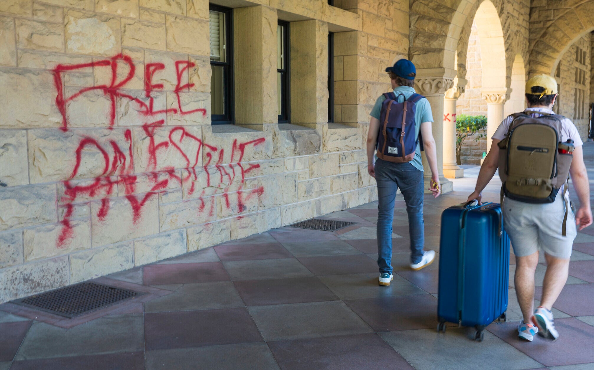 Felony charges against five Stanford protesters dropped under community service diversion agreement.