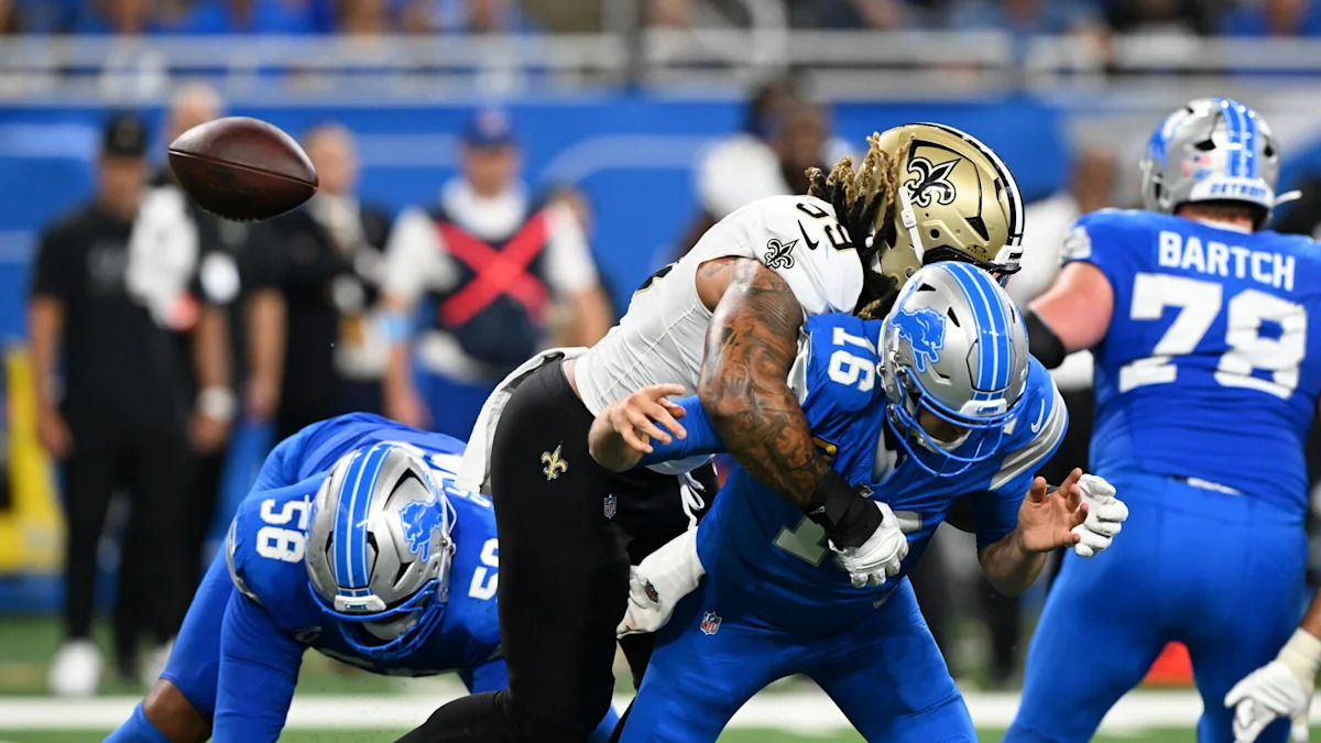 Replay review overturns Saints touchdown against Lions following controversial passing rule interpretation.