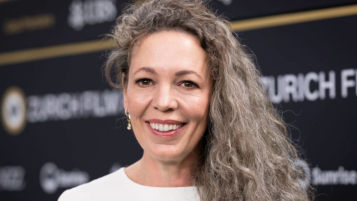 Olivia Colman debuts striking silver-gray hair at the Zurich Film Festival premiere.