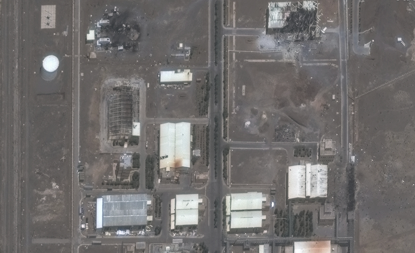 Satellite imagery shows Iran is rapidly rebuilding its secretive Parchin nuclear facility after strikes.