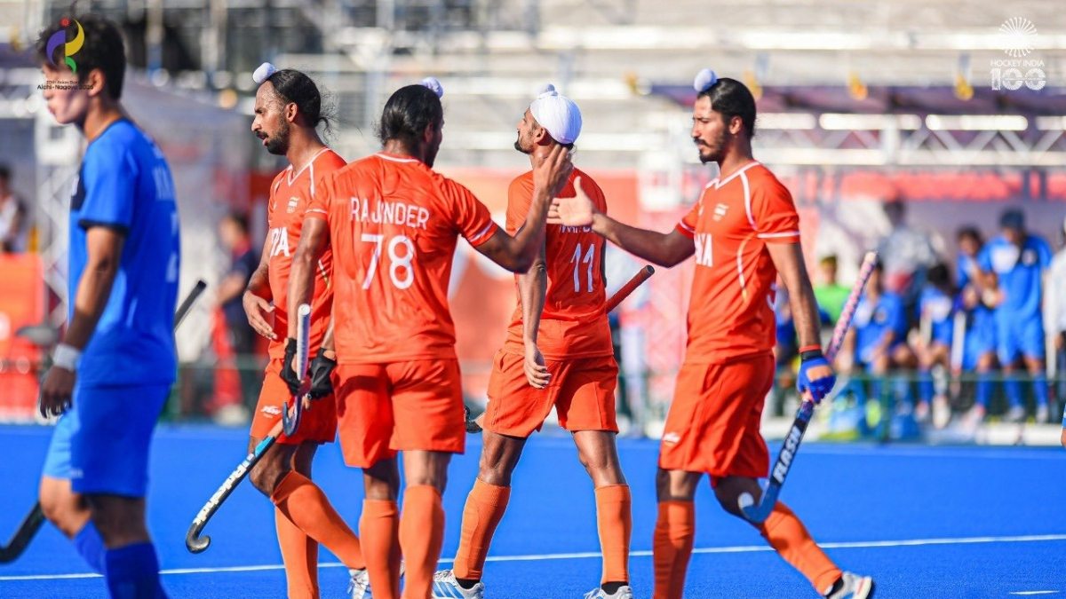 India routs Bangladesh 10-0 in hockey to set up a semifinal clash against Pakistan.