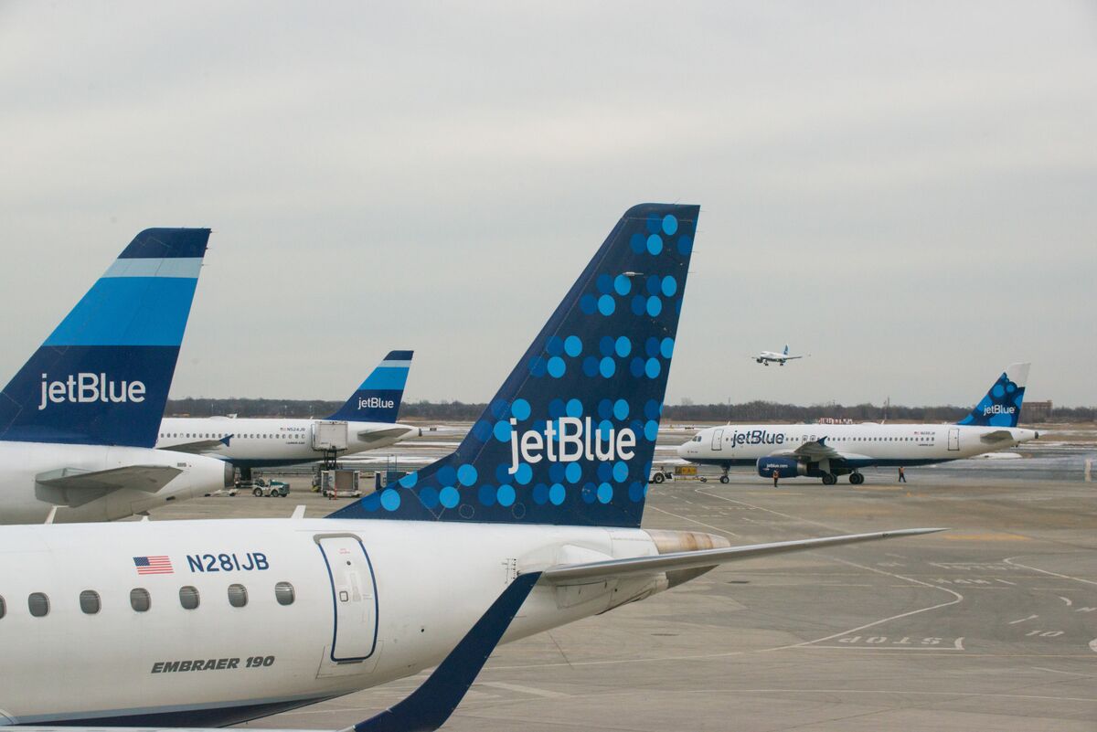 JetBlue raises its revenue outlook despite weather disruptions and increasing fuel costs.