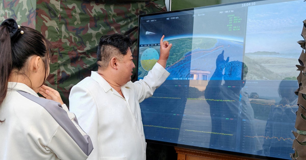 North Korea successfully tests a new weapon system under the supervision of Kim Jong Un.