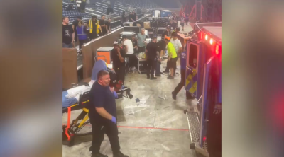 Six workers injured by falling equipment during stage teardown after Detroit concert.