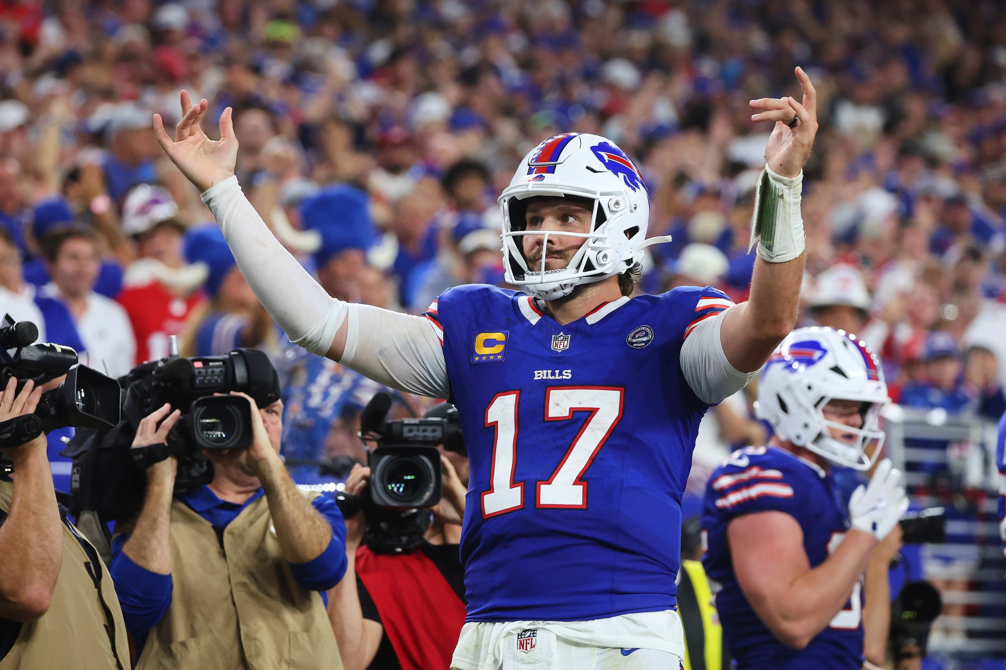 Josh Allen accounts for five touchdowns as Buffalo defeats Detroit in stadium opener.