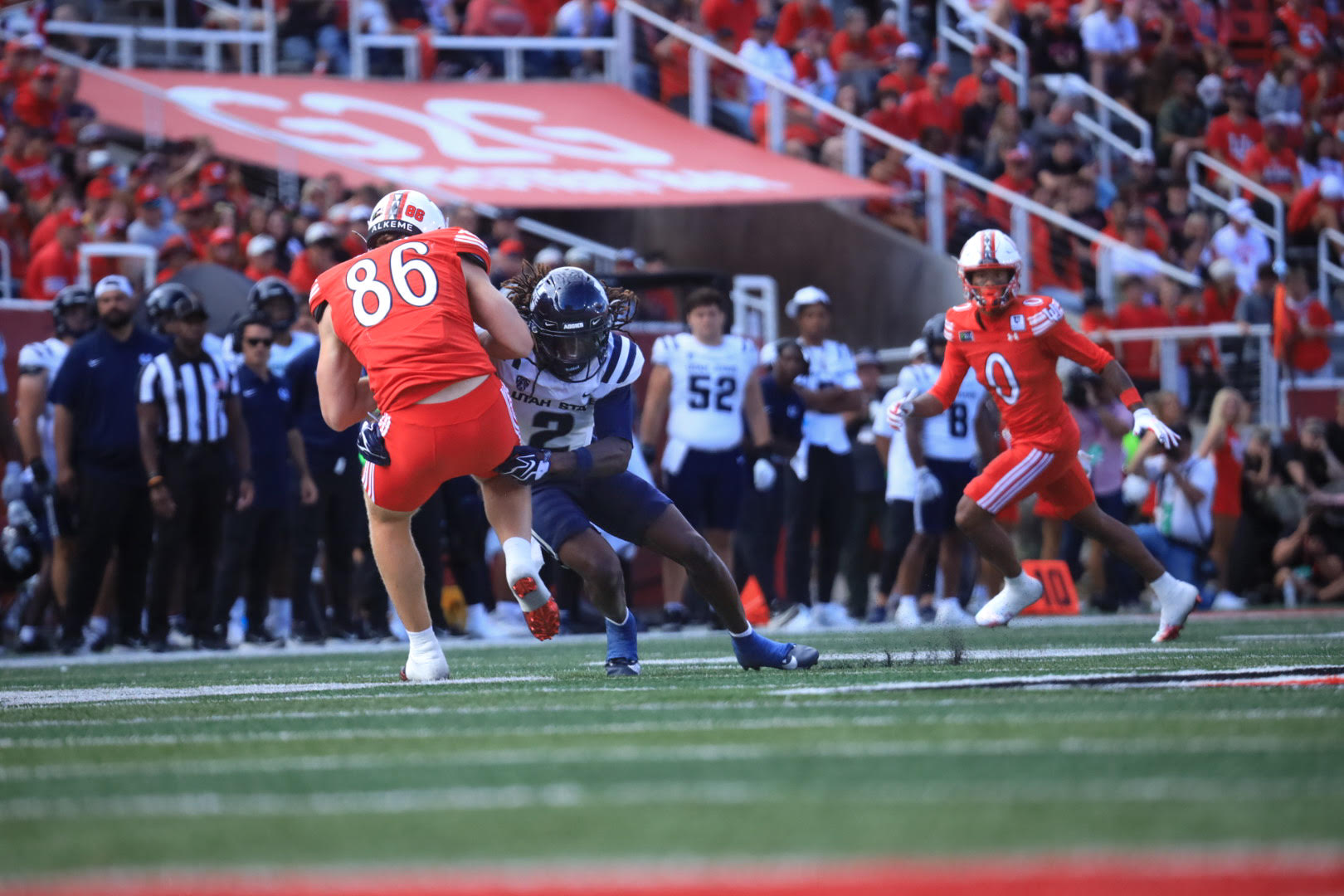 No. 17 Utah routs Utah State 33-0 to improve its record to 3-0.