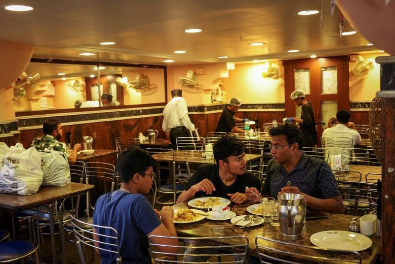 India's services sector growth picks up slightly in August but stays near four-year low.